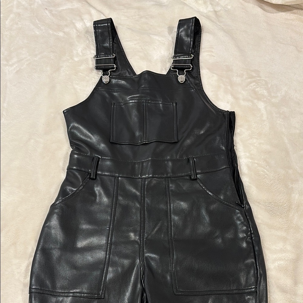 Black Jumpsuit with Sleeveless Design and Adjustable Straps